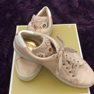 Lace up soft pink tennis shoes